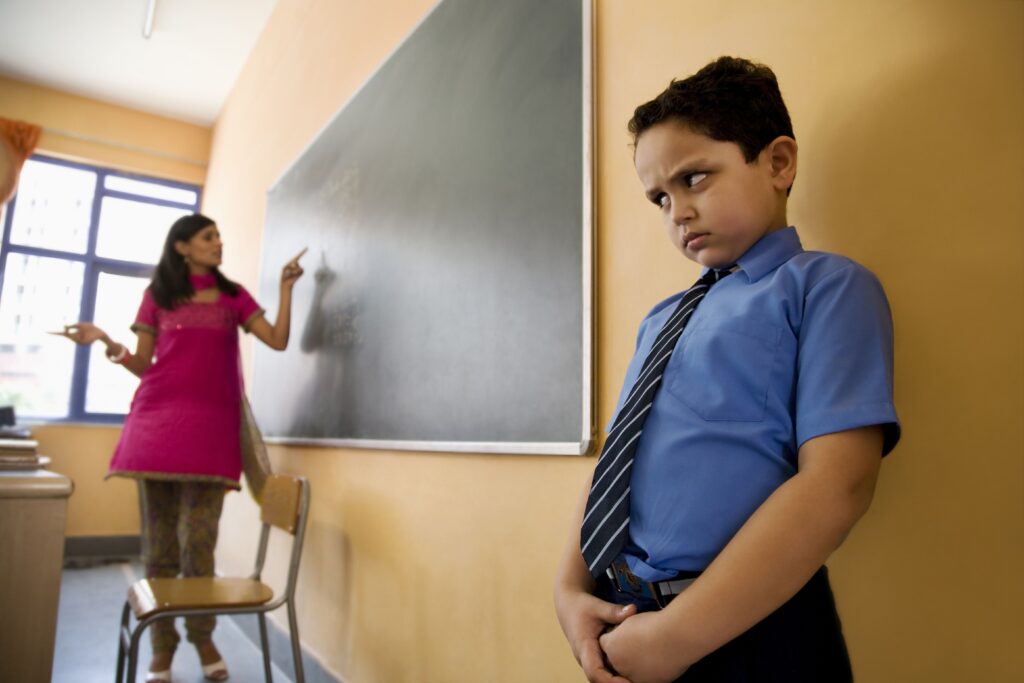 School Boy Being Punished 596616544 593e1d985f9b58d58a7a4c31