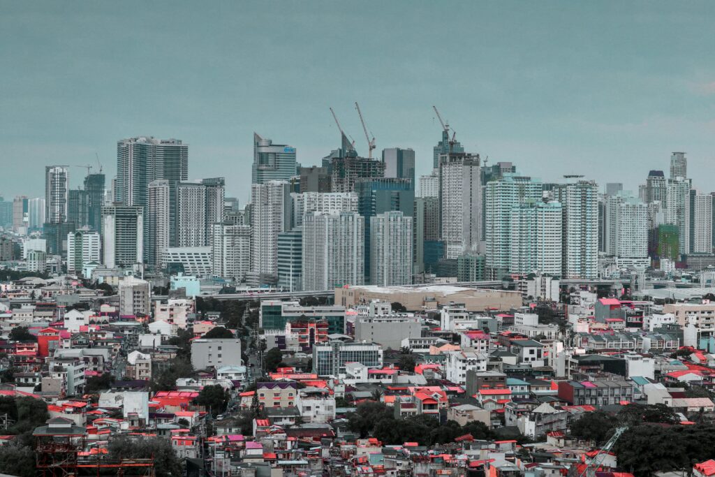 Luxurious high rise buildings and crowded, impoverished neighborhoods