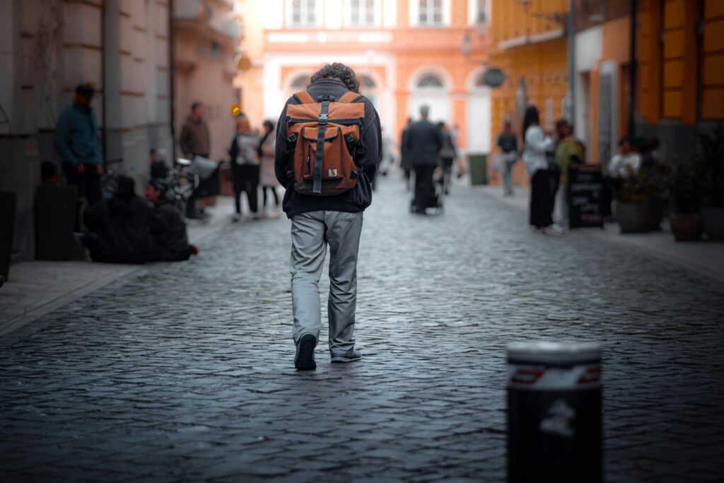 Traveler confidently explores the city streets, carrying an anti theft bag